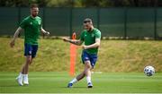 1 June 2021; Troy Parrott and Conor Hourihane, left, during a Republic of Ireland training session at PGA Catalunya Resort in Girona, Spain. Photo by Stephen McCarthy/Sportsfile