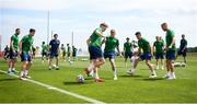 1 June 2021; Ronan Curtis is tackled by James McClean during a Republic of Ireland training session at PGA Catalunya Resort in Girona, Spain. Photo by Stephen McCarthy/Sportsfile