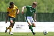 2 June 2021; Luca Connell of Republic of Ireland in action against Caleb Cassius Watts of Australia during the U21 International friendly match between Australia and Republic of Ireland at Marbella Football Centre in Marbella, Spain. Photo by Mateo Villalba Sanchez/Sportsfile