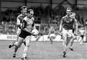 2 June 1991; Tommy Carr of Dublin is tackled by Colm O'Rourke of Meath during the Leinster Senior Football Championship Preliminary Round match between Dublin and Meath at Croke Park in Dublin. Photo by Ray McManus/Sportsfile