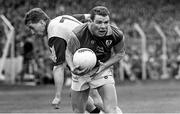 2 June 1991; Tommy Dowd of Meath in action against Eamonn Heary of Dublin during the Leinster Senior Football Championship Preliminary Round match between Dublin and Meath at Croke Park in Dublin. Photo by Ray McManus/Sportsfile