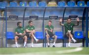3 June 2021; Republic of Ireland players, from right, Shane Duffy, James McClean, Seamus Coleman and Harry Arter sit in the dugout before the International friendly match between Andorra and Republic of Ireland at Estadi Nacional in Andorra. Photo by Stephen McCarthy/Sportsfile