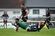 4 June 2021; Bundee Aki of Connacht is tackled by Dewi Cross of Ospreys during the Guinness PRO14 Rainbow Cup match between Connacht and Ospreys at The Sportsground in Galway. Photo by Piaras Ó Mídheach/Sportsfile