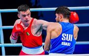 4 June 2021; Emmet Brennan of Ireland, left, and Uke Smajli of Switzerland in their light heavyweight 81kg round of 16 bout on day one of the Road to Tokyo European Boxing Olympic qualifying event at Le Grand Dome in Paris, France. Photo by Baptiste Fernandez/Sportsfile