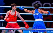 4 June 2021; Aidan Walsh of Ireland, left, and Wahid Hambli of France in their welterweight 69kg round of 16 bout on day one of the Road to Tokyo European Boxing Olympic qualifying event at Le Grand Dome in Paris, France. Photo by Baptiste Fernandez/Sportsfile