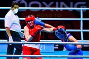 4 June 2021; Aoife O'Rourke of Ireland, right, and Viktoryia Kebikava of Belarus in their middleweight 75kg round of 16 bout on day one of the Road to Tokyo European Boxing Olympic qualifying event at Le Grand Dome in Paris, France. Photo by Baptiste Fernandez/Sportsfile