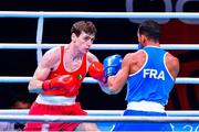 4 June 2021; Aidan Walsh of Ireland, left, and Wahid Hambli of France in their welterweight 69kg round of 16 bout on day one of the Road to Tokyo European Boxing Olympic qualifying event at Le Grand Dome in Paris, France. Photo by Baptiste Fernandez/Sportsfile