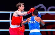 4 June 2021; Aidan Walsh of Ireland, left, and Wahid Hambli of France in their welterweight 69kg round of 16 bout on day one of the Road to Tokyo European Boxing Olympic qualifying event at Le Grand Dome in Paris, France. Photo by Baptiste Fernandez/Sportsfile