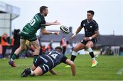 4 June 2021; Jack Carty of Connacht offloads as Dewi Cross of Ospreys closes in during the Guinness PRO14 Rainbow Cup match between Connacht and Ospreys at The Sportsground in Galway. Photo by Piaras Ó Mídheach/Sportsfile