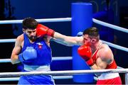 4 June 2021; Emmet Brennan of Ireland, right, and Uke Smajli of Switzerland in their light heavyweight 81kg round of 16 bout on day one of the Road to Tokyo European Boxing Olympic qualifying event at Le Grand Dome in Paris, France. Photo by Baptiste Fernandez/Sportsfile