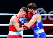 4 June 2021; Emmet Brennan of Ireland, left, and Uke Smajli of Switzerland in their light heavyweight 81kg round of 16 bout on day one of the Road to Tokyo European Boxing Olympic qualifying event at Le Grand Dome in Paris, France. Photo by Baptiste Fernandez/Sportsfile