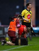 28 May 2021; Craig Casey of Munster receives medical attention for an injury during the Guinness PRO14 Rainbow Cup match between Munster and Cardiff Blues at Thomond Park in Limerick. Photo by Piaras Ó Mídheach/Sportsfile