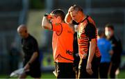 29 May 2021; Armagh manager Kieran McGeeney, left, and Armagh coach Kieran Donaghy after the drawn Allianz Football League Division 1 North Round 3 match between Armagh and Donegal at the Athletic Grounds in Armagh. Photo by Piaras Ó Mídheach/Sportsfile