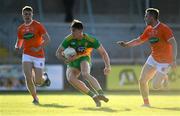 29 May 2021; Michael Langan of Donegal in action against Oisin O'Neill, left, and Ciaron O'Hanlon of Armagh during the Allianz Football League Division 1 North Round 3 match between Armagh and Donegal at the Athletic Grounds in Armagh. Photo by Piaras Ó Mídheach/Sportsfile
