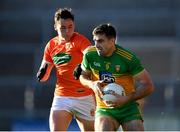 29 May 2021; Caolan McGonagle of Donegal in action against Aaron McKay of Armagh during the Allianz Football League Division 1 North Round 3 match between Armagh and Donegal at the Athletic Grounds in Armagh. Photo by Piaras Ó Mídheach/Sportsfile