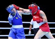 4 June 2021; Kellie Harrington of Ireland, left, and Aneta Rygielska of Poland in their lightweight 60kg bout on day one of the Road to Tokyo European Boxing Olympic qualifying event at Le Grand Dome in Paris, France. Photo by Sportsfile
