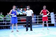 4 June 2021; Kellie Harrington of Ireland, left, celebrates victory over Aneta Rygielska of Poland in their lightweight 60kg bout on day one of the Road to Tokyo European Boxing Olympic qualifying event at Le Grand Dome in Paris, France. Photo by Sportsfile