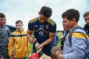 5 June 2021; Lee Chin of Wexford signs autographs for supporters following the Allianz Hurling League Division 1 Group B Round 4 match between Antrim and Wexford at Corrigan Park in Belfast. Photo by David Fitzgerald/Sportsfile