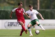 5 June 2021; Will Ferry of Republic of Ireland in action against William Boving of Denmark during the U21 international friendly match between Republic of Ireland and Denmark at Dama de Noche Football Centre in Marbella, Spain. Photo by Mateo Villalba Sanchez/Sportsfile