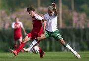 5 June 2021; Tyreik Wright of Republic of Ireland in action against William Boving of Denmark during the U21 international friendly match between Republic of Ireland and Denmark at Dama de Noche Football Centre in Marbella, Spain. Photo by Mateo Villalba Sanchez/Sportsfile