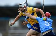 5 June 2021; Aron Shanagher of Clare is tackled by Eoghan O'Donnell, behind, and Paddy Smyth of Dublin during the Allianz Hurling League Division 1 Group B Round 4 match between Dublin and Clare at Parnell Park in Dublin. Photo by Piaras Ó Mídheach/Sportsfile