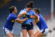 5 June 2021; Niamh McEvoy of Dublin is tackled by Maria Curley, left, and Lucy Spillane of Tipperary during the Lidl Ladies Football National League Division 1B Round 3 match between Tipperary and Dublin at Semple Stadium in Thurles, Tipperary. Photo by Seb Daly/Sportsfile