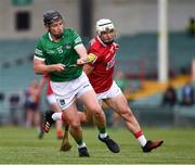 5 June 2021; Peter Casey of Limerick is tackled by Sean O'Leary Hayes of Cork during the Allianz Hurling League Division 1 Group A Round 4 match between Limerick and Cork at LIT Gaelic Grounds in Limerick. Photo by Ray McManus/Sportsfile