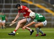5 June 2021; Pat Ryan of Limerick is tackled by Damien Cahalane of Cork during the Allianz Hurling League Division 1 Group A Round 4 match between Limerick and Cork at LIT Gaelic Grounds in Limerick. Photo by Ray McManus/Sportsfile