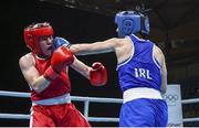5 June 2021; Kellie Harrington of Ireland, right, and Maïva Hamadouche of France during their lightweight 60kg quarter-final bout on day two of the Road to Tokyo European Boxing Olympic qualifying event at Le Grand Dome in Paris, France. Photo by Sportsfile