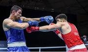 5 June 2021; Gytis Lisinskas of Ireland, right, and Petar Belberov of Bulgaria during their super-heavyweight +91kg round of 16 bout on day two of the Road to Tokyo European Boxing Olympic qualifying event at Le Grand Dome in Paris, France. Photo by Sportsfile