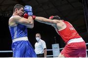 5 June 2021; Gytis Lisinskas of Ireland, right, and Petar Belberov of Bulgaria during their super-heavyweight +91kg round of 16 bout on day two of the Road to Tokyo European Boxing Olympic qualifying event at Le Grand Dome in Paris, France. Photo by Sportsfile