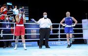 5 June 2021; Aoife O'Rourke of Ireland, left, is declared the winner over Elzbieta Wójcik of Poland after their middleweight 75kg quarter-final bout on day two of the Road to Tokyo European Boxing Olympic qualifying event at Le Grand Dome in Paris, France. Photo by Sportsfile