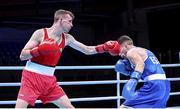 5 June 2021; Brendan Irvine of Ireland, left, and Gabriel Escobar of Spain during their flyweight 52kg quarter-final bout on day two of the Road to Tokyo European Boxing Olympic qualifying event at Le Grand Dome in Paris, France. Photo by Sportsfile