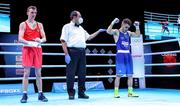 5 June 2021; Gabriel Escobar of Spain, right, is declared the winner over Brendan Irvine of Ireland during their flyweight 52kg quarter-final bout on day two of the Road to Tokyo European Boxing Olympic qualifying event at Le Grand Dome in Paris, France. Photo by Sportsfile