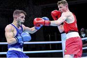 5 June 2021; Brendan Irvine of Ireland, right, and Gabriel Escobar of Spain during their flyweight 52kg quarter-final bout on day two of the Road to Tokyo European Boxing Olympic qualifying event at Le Grand Dome in Paris, France. Photo by Sportsfile