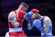 5 June 2021; Emmet Brennan of Ireland, left, and Luka Plantic of Croatia during their light heavyweight 81kg quarter-final bout on day two of the Road to Tokyo European Boxing Olympic qualifying event at Le Grand Dome in Paris, France. Photo by Sportsfile