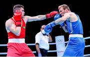 5 June 2021; Emmet Brennan of Ireland, left, and Luka Plantic of Croatia during their light heavyweight 81kg quarter-final bout on day two of the Road to Tokyo European Boxing Olympic qualifying event at Le Grand Dome in Paris, France. Photo by Sportsfile
