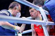 5 June 2021; Emmet Brennan of Ireland with coach Zaur Antia during his light heavyweight 81kg quarter-final bout against Luka Plantic of Croatia on day two of the Road to Tokyo European Boxing Olympic qualifying event at Le Grand Dome in Paris, France. Photo by Sportsfile