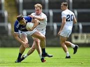 30 May 2021; John O'Loughlin of Laois in action against Luke Flynn of Kildare during the Allianz Football League Division 2 South Round 3 match between Laois and Kildare at MW Hire O'Moore Park in Portlaoise, Laois. Photo by Piaras Ó Mídheach/Sportsfile