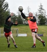 10 June 2021; Seamus McMahon in action against Declan Moane at the GAA for Dads & Lads Launch at St. Patricks GFC in Donagh, Fermanagh. Photo by David Fitzgerald/Sportsfile