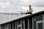 6 June 2021; Offaly supporter Brendan Monaghan, from Kilcormac, Offaly, watches the game from outside the grounds during the Allianz Hurling League Division 2A Round 4 match between Offaly and Down at Bord na Móna O'Connor Park in Tullamore, Offaly. Photo by Sam Barnes/Sportsfile
