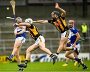 6 June 2021; Paddy Purcell of Laois has his shot blocked down by Michael Carey, left, and Conor Fogarty of Kilkenny during the Allianz Hurling League Division 1 Group B Round 4 match between Kilkenny and Laois at UPMC Nowlan Park in Kilkenny. Photo by Eóin Noonan/Sportsfile