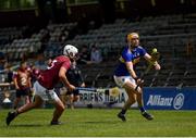 6 June 2021; Séamus Callanan of Tipperary in action against Tommy Gallagher of Westmeath during the Allianz Hurling League Division 1 Group A Round 4 match between Westmeath and Tipperary at TEG Cusack Park in Mullingar, Westmeath. Photo by Seb Daly/Sportsfile