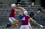 6 June 2021; John McGrath of Tipperary in action against Tommy Gallagher, left, and Conor Shaw of Westmeath during the Allianz Hurling League Division 1 Group A Round 4 match between Westmeath and Tipperary at TEG Cusack Park in Mullingar, Westmeath. Photo by Seb Daly/Sportsfile