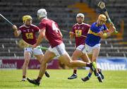 6 June 2021; Mark Kehoe of Tipperary shoots to score his side's fourth goal, despite pressure from Westmeath's Aaron Craig, left, during the Allianz Hurling League Division 1 Group A Round 4 match between Westmeath and Tipperary at TEG Cusack Park in Mullingar, Westmeath. Photo by Seb Daly/Sportsfile