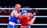 6 June 2021; Aidan Walsh of Ireland, right, and Yevhenii Barabanov of Ukraine in their welterweight 69kg quarter-final bout on day three of the Road to Tokyo European Boxing Olympic qualifying event at Le Grand Dome in Paris, France. Photo by Baptiste Fernandez/Sportsfile