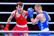 6 June 2021; Aidan Walsh of Ireland, left, and Yevhenii Barabanov of Ukraine in their welterweight 69kg quarter-final bout on day three of the Road to Tokyo European Boxing Olympic qualifying event at Le Grand Dome in Paris, France. Photo by Baptiste Fernandez/Sportsfile