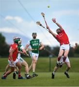 6 June 2021; David Kettle of Louth takes the ball ahead of Conor McShea of Fermanagh during the Allianz Hurling League Roinn 3B match between Louth and Fermanagh at Louth Centre of Excellence in Darver, Louth. Photo by David Fitzgerald/Sportsfile
