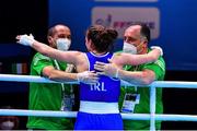 7 June 2021; Michaela Walsh of Ireland celebrates with coaches Dmitry Dmitruk, left, and Zaur Antia after winning her featherweight semi-final bout against Stanimira Petrova of Bulgaria on day four of the Road to Tokyo European Boxing Olympic qualifying event at Le Grand Dome in Paris, France. Photo by Baptiste Fernandez/Sportsfile