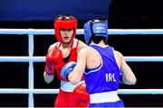 7 June 2021; Esra Yildiz of Turkey, right, and Kellie Harrington of Ireland in their lightweight 60kg semi-final bout on day four of the Road to Tokyo European Boxing Olympic qualifying event at Le Grand Dome in Paris, France. Photo by Baptiste Fernandez/Sportsfile